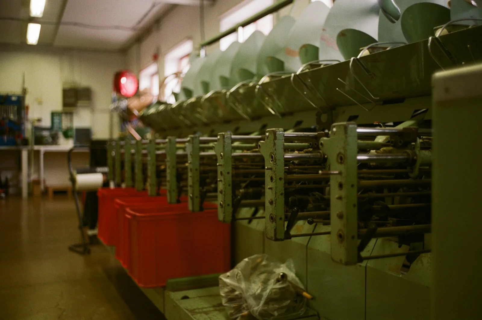 Industrial machinery inside a textile weaving mill